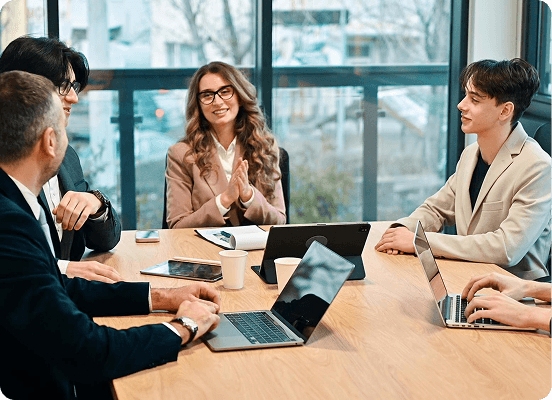 A BulkPoint team collaborating around a table